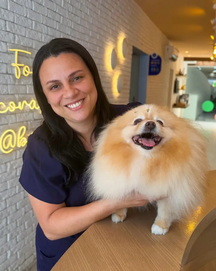 Lulu da Pomerânia com a equipe